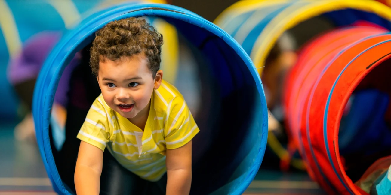 Toddler playing at child development center