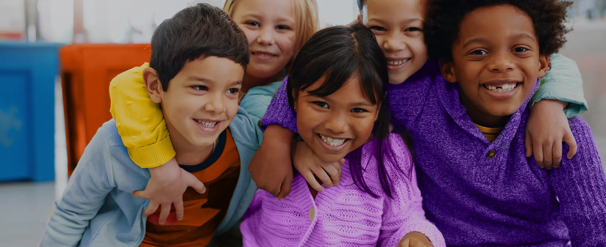 Multi-Cultural kids smiling.